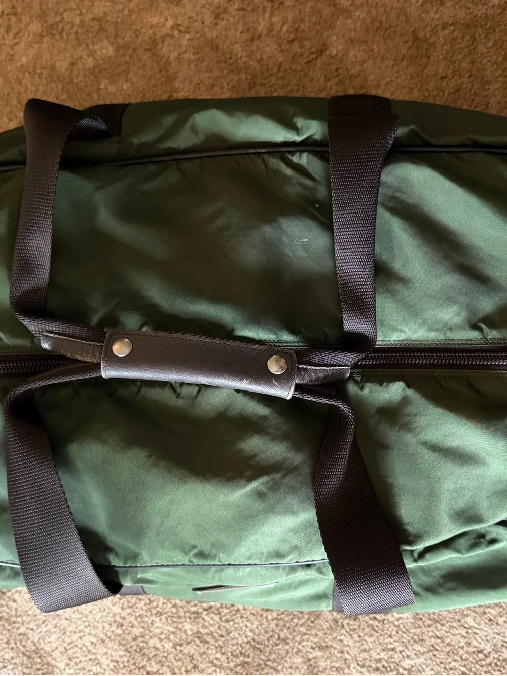 Prada Dark Olive Nylon Duffel Bag with Black Straps. Versatile Travel Piece!